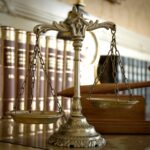 A close up of the scales of justice on top of a table